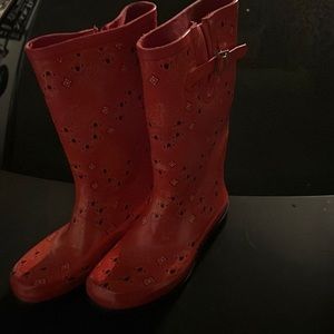 Red and Black Nomad Rain boots.